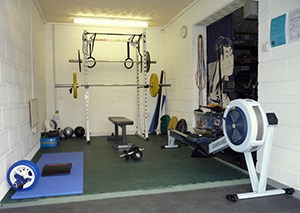 Cardio Workout Focused With A Touch Of Heavy Weightlifting Garage Gym Idea.