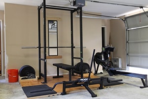 Home Gym Mirror Looks Clean In This Organized Rogue Fitness Equipped Garage Gym. Letting Just Enough Sunshine In.