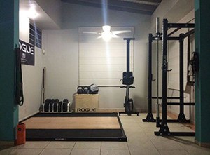 The Window Shade On This Garage Gym Idea Is Closed, But Imagine When Its Sunny And You're Doing Deadlifts.